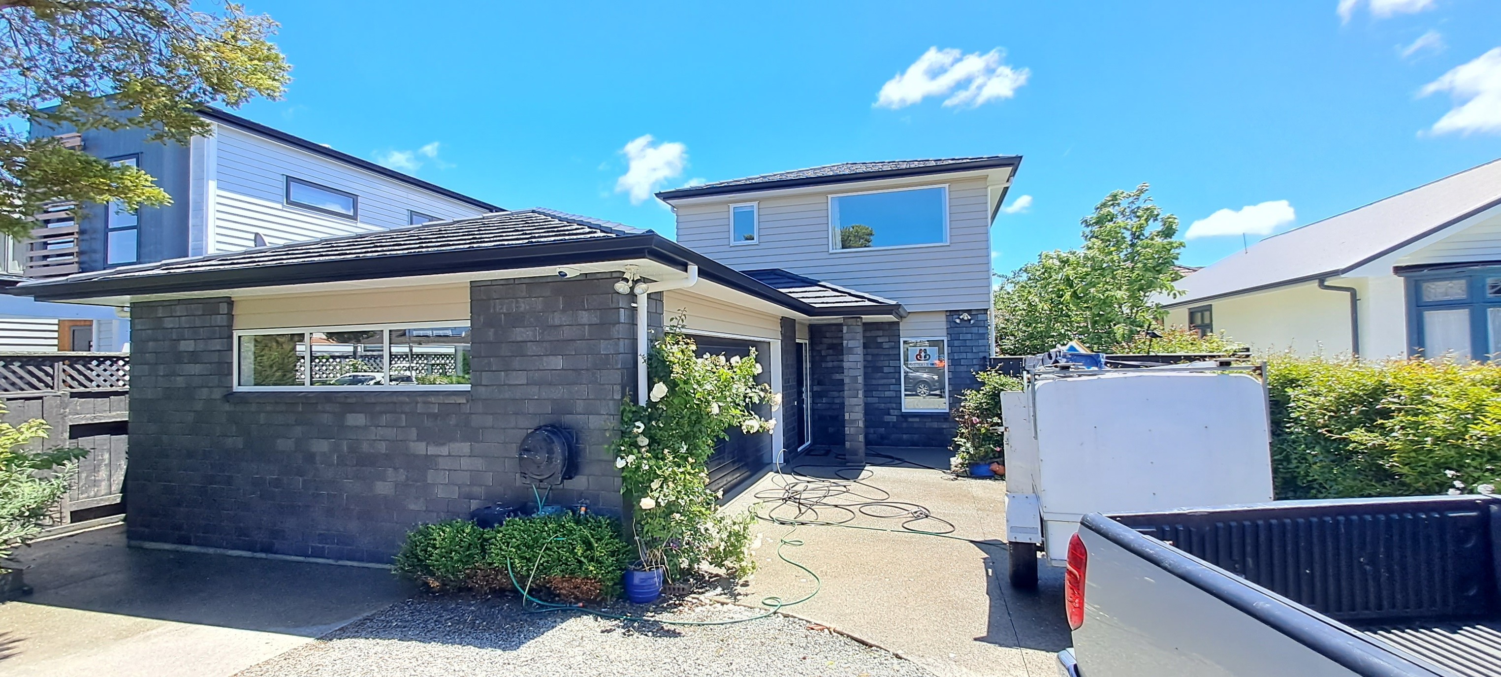House exterior with trailer